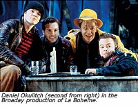 Daniel Okulitch (2nd from right)